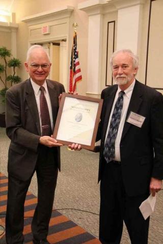 Outgoing President Dennis Mitchell