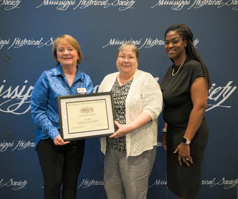 Award of Merit - City of Madison for installing 10 historical markers. Accepting are Alderwoman Janie Jarvis and Lucy Weber.