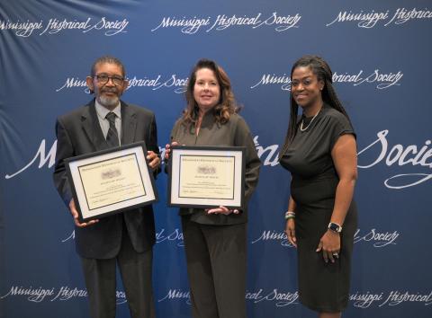 Award of Merit - Natchez Museum of African American History and Culture and City of Natchez for designating 27 African American historical sites with signs. Accepting are museum director Bobby Dennis and Natchez First Lady Marla Gibson.