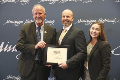 Award of Merit - City of Long Beach for restoration of W.J. Quarles House. Accepting are Mayor George Bass and Courtney Cuevas.