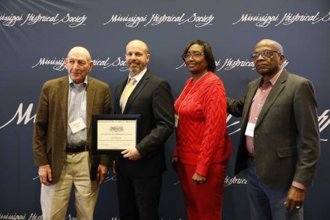 Excellence in History Award - Hill Country Project for preserving the history of the Civil Rights Movement in Benton County. Accepting are Stephen Klein, Rubye DeBerry, and Roy DeBerry.
