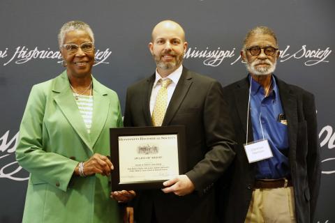 Award of Merit - Friends of Valena C. Jones School for its oral history project interviewing former students and faculty of the school, preserving their memories of the Hancock County institution, and documenting their experiences during integration. Accepting are Cheryl Thompson and Clarence Harris.