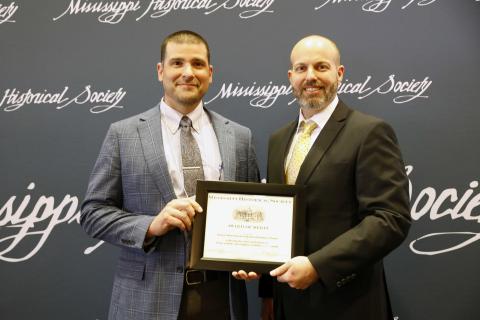 Award of Merit - Historic Biloxi Schools Collection Oral History Project for collecting voices and histories of people who attended or worked in Biloxi Public Schools showing a history not found in textbooks. Accepting is Biloxi Superintendent Marcus Boudreaux.