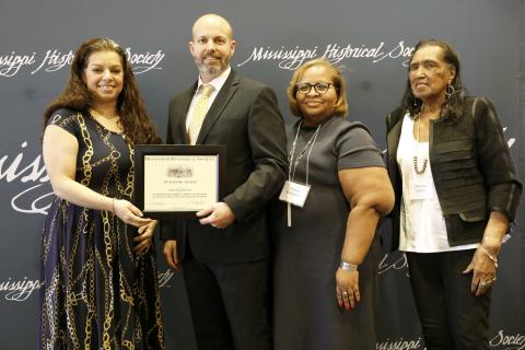 Award of Merit - Jackson State University for the Gowdy Washington Addition Exhibition about one of the first African American communities in the city of Jackson. Accepting is Dr. Heather Denne, director of community engagement at Jackson State University, along with Melvina Deans and Felicia McClinton.