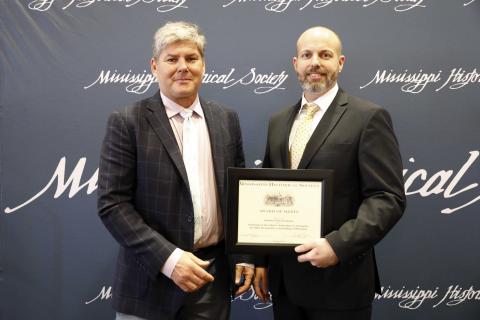 Award of Merit - LaPointe Krebs Foundation for the restoration of the states oldest documented standing building, the de la Pointe Krebs House in Pascagoula. Accepting is Walter Gautier.