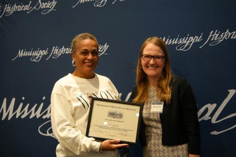 Award of Merit - Bridging Winona for commemorating the life of Fannie Lou Hamer. Accepting is Vickie Roberts-Ratliff.