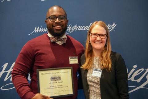 Award of Merit - The Laurel Black History Project for expanding knowledge of Black history in Laurel. Accepting is Derrion Arrington.